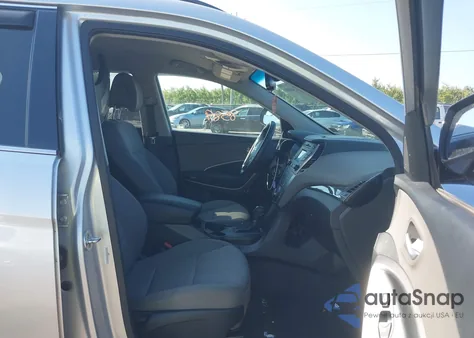 2015 Hyundai Santa Fe Sport 2.4L z USA, uszkodzony, nr VIN 5XYZUDLB7FG277165